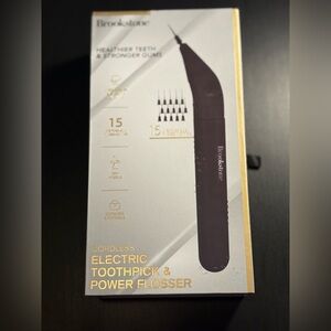 Brookstone Electric Toothpick & Power Flosser - Black with Gold Accents